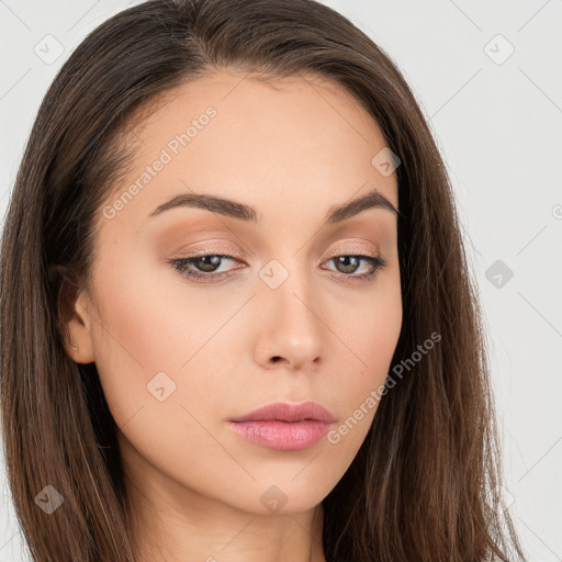 Neutral white young-adult female with long  brown hair and brown eyes