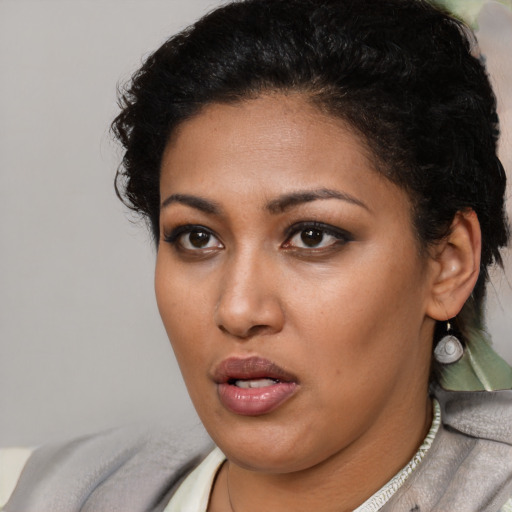 Neutral black young-adult female with short  black hair and brown eyes