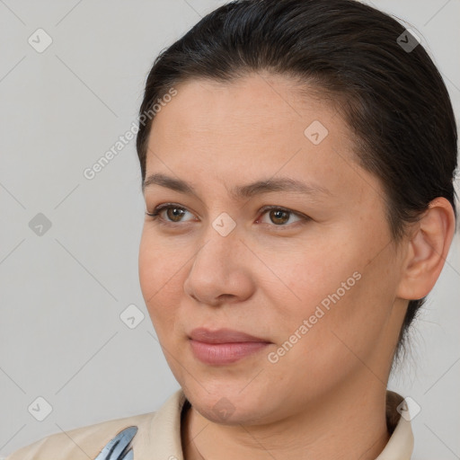 Joyful white adult female with short  brown hair and brown eyes