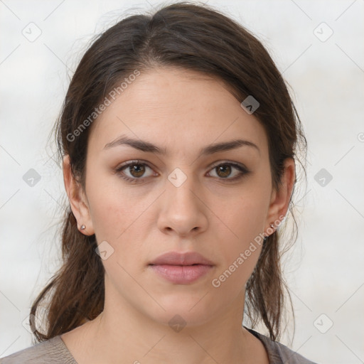 Neutral white young-adult female with medium  brown hair and brown eyes