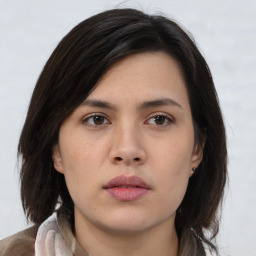 Neutral asian young-adult female with medium  brown hair and brown eyes