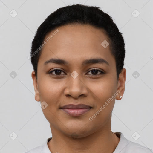 Joyful latino young-adult female with short  black hair and brown eyes