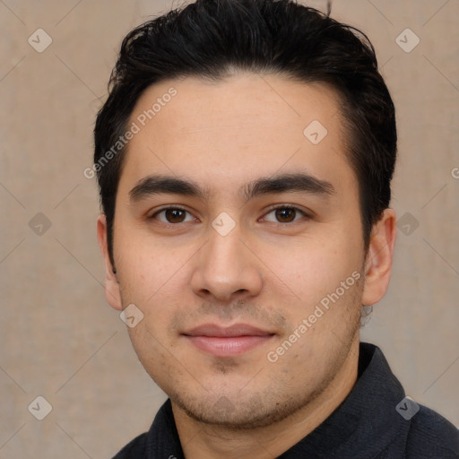 Joyful white young-adult male with short  black hair and brown eyes