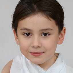 Joyful white child female with short  brown hair and brown eyes