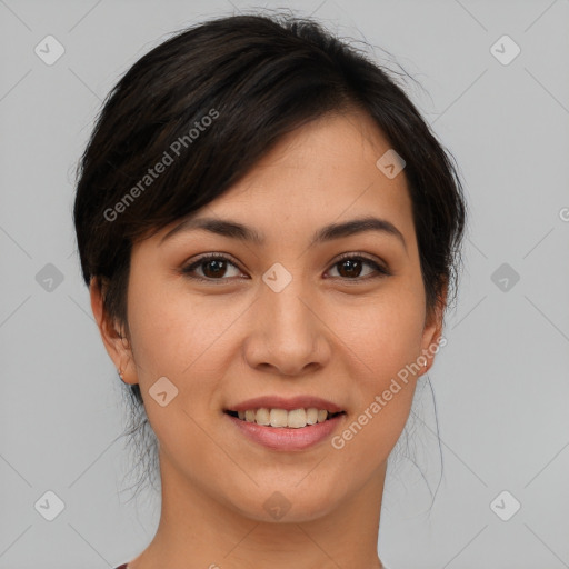 Joyful asian young-adult female with short  brown hair and brown eyes