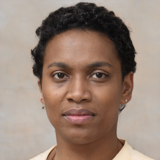 Neutral black young-adult female with short  black hair and brown eyes