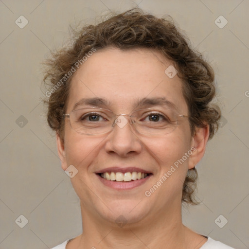 Joyful white adult female with short  brown hair and brown eyes