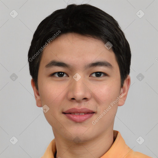 Joyful asian young-adult male with short  black hair and brown eyes