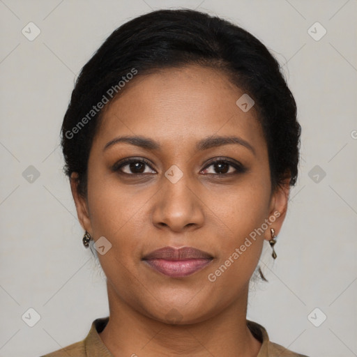 Joyful black young-adult female with short  brown hair and brown eyes