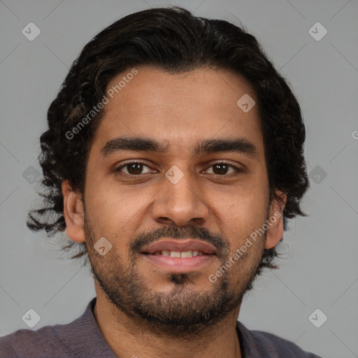 Joyful latino young-adult male with short  brown hair and brown eyes