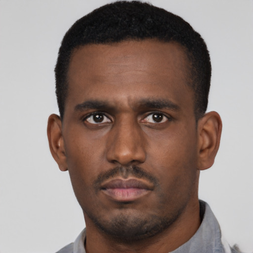 Neutral black young-adult male with short  black hair and brown eyes