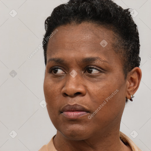 Neutral black young-adult female with short  brown hair and brown eyes