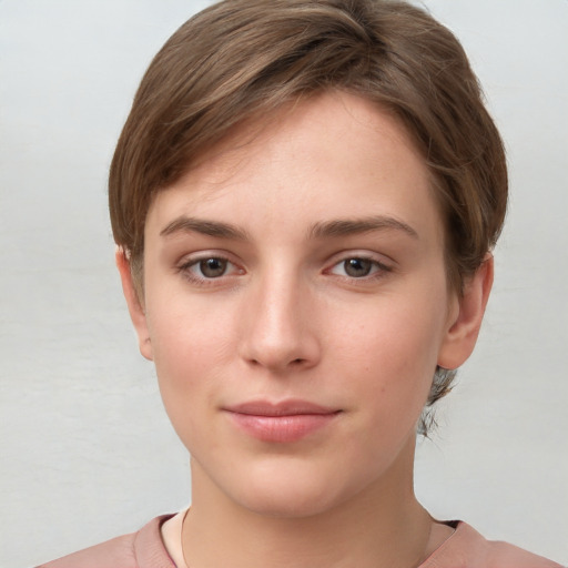 Neutral white young-adult female with short  brown hair and brown eyes