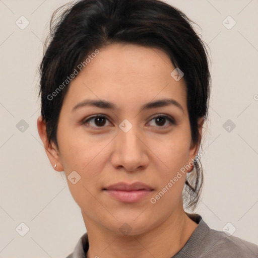 Joyful white young-adult female with short  black hair and brown eyes