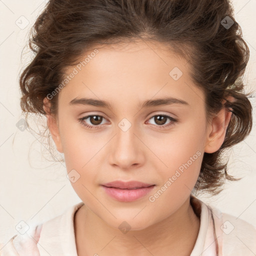 Joyful white child female with medium  brown hair and brown eyes