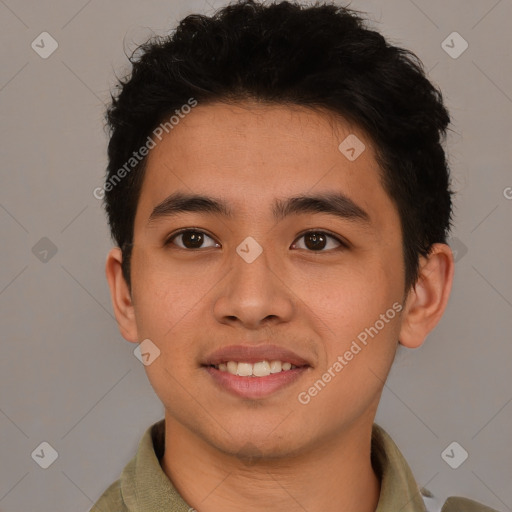 Joyful latino young-adult male with short  brown hair and brown eyes