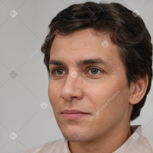 Neutral white adult male with short  brown hair and brown eyes