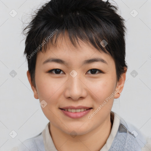 Joyful asian young-adult female with short  brown hair and brown eyes