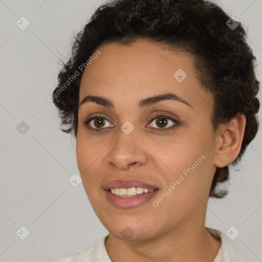 Joyful latino young-adult female with short  brown hair and brown eyes