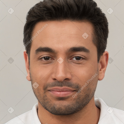 Joyful white young-adult male with short  brown hair and brown eyes