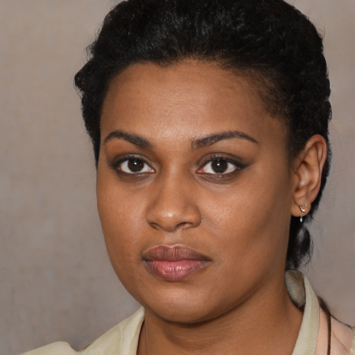 Neutral black young-adult female with short  black hair and brown eyes