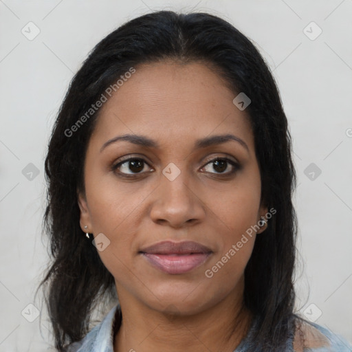 Joyful latino young-adult female with long  brown hair and brown eyes