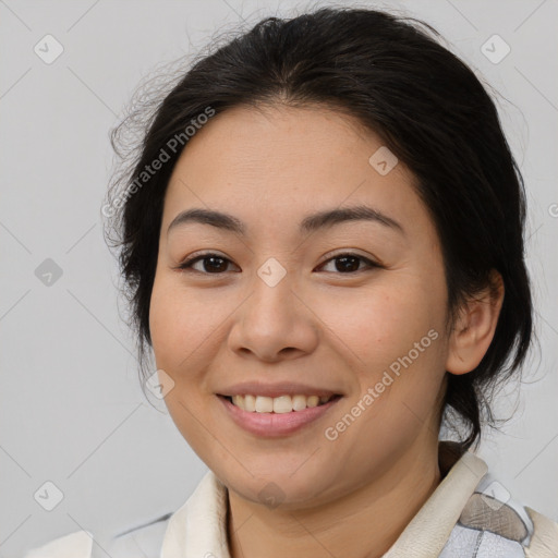 Joyful asian young-adult female with medium  brown hair and brown eyes