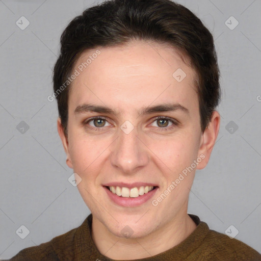 Joyful white young-adult female with short  brown hair and grey eyes