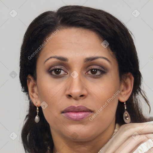 Joyful latino young-adult female with medium  brown hair and brown eyes
