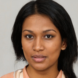 Neutral asian young-adult female with medium  black hair and brown eyes