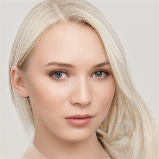 Neutral white young-adult female with long  blond hair and brown eyes