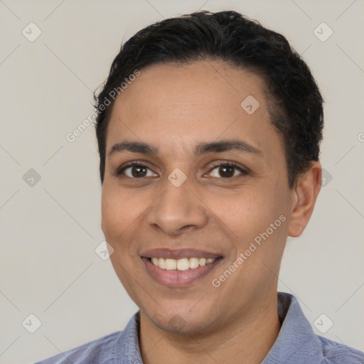 Joyful latino young-adult female with short  brown hair and brown eyes