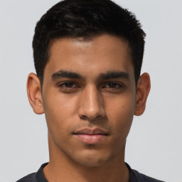 Neutral latino young-adult male with short  brown hair and brown eyes