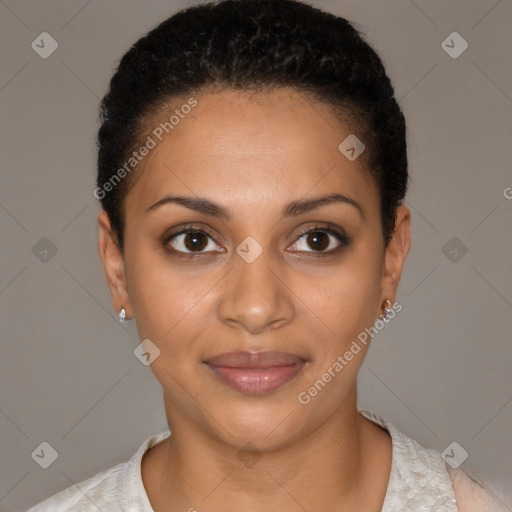 Joyful black young-adult female with short  brown hair and brown eyes