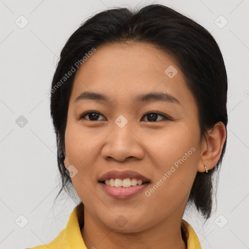 Joyful asian young-adult female with medium  brown hair and brown eyes