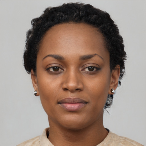 Neutral black young-adult female with short  black hair and brown eyes