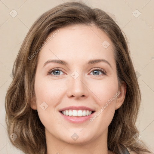 Joyful white young-adult female with medium  brown hair and green eyes