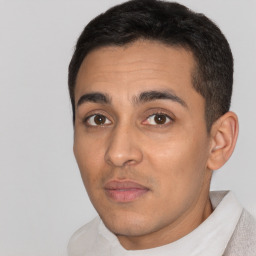 Neutral white young-adult male with short  black hair and brown eyes