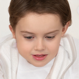 Joyful white child female with short  brown hair and brown eyes