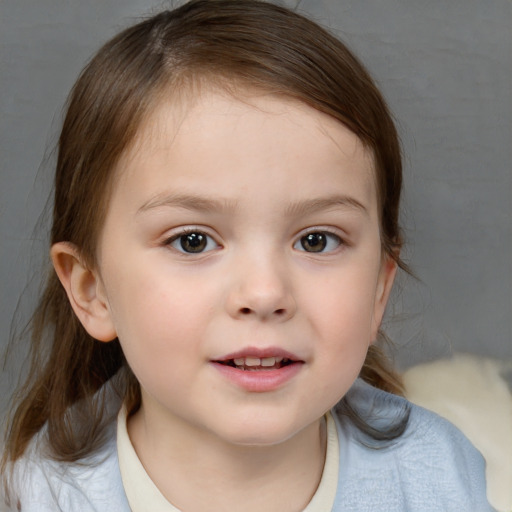 Joyful white child female with medium  brown hair and brown eyes