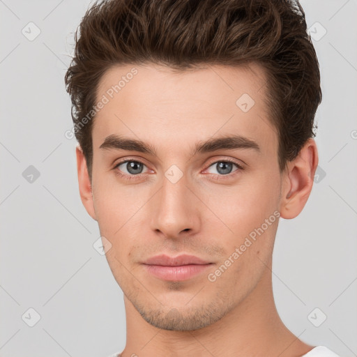 Neutral white young-adult male with short  brown hair and brown eyes