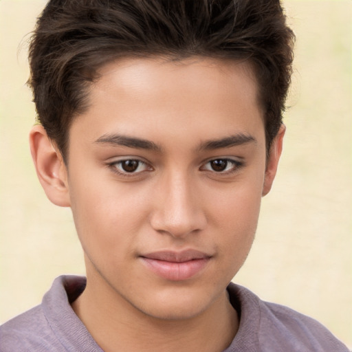 Joyful white child male with short  brown hair and brown eyes