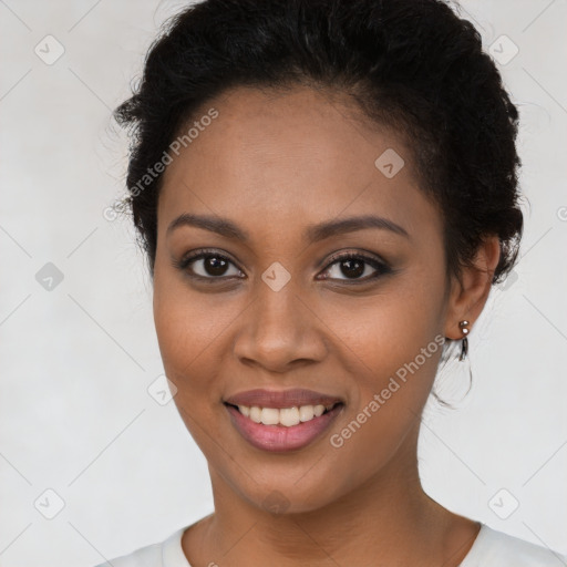 Joyful latino young-adult female with short  black hair and brown eyes