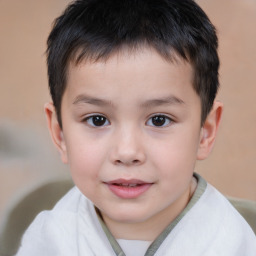 Joyful white child male with short  brown hair and brown eyes