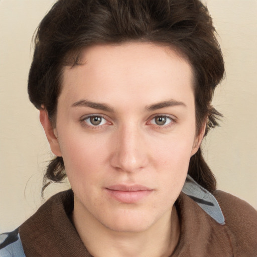 Neutral white young-adult female with short  brown hair and brown eyes