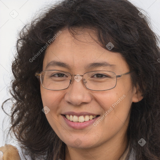 Joyful white adult female with long  brown hair and brown eyes