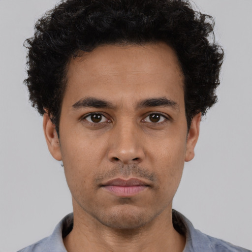 Neutral white young-adult male with short  black hair and brown eyes