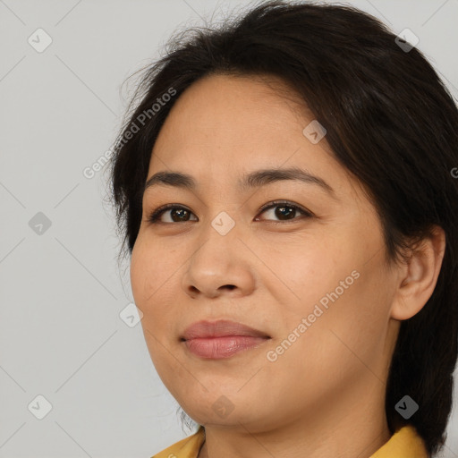 Joyful white young-adult female with medium  brown hair and brown eyes