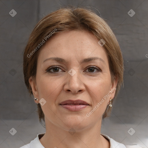 Joyful white adult female with short  brown hair and grey eyes