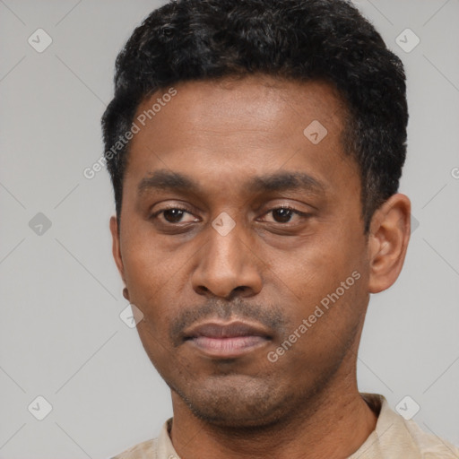 Neutral latino young-adult male with short  black hair and brown eyes